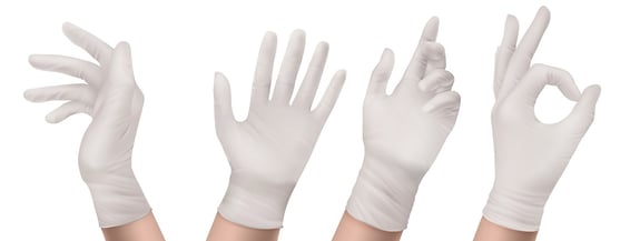 A hand wearing cleanroom gloves depict different shapes.