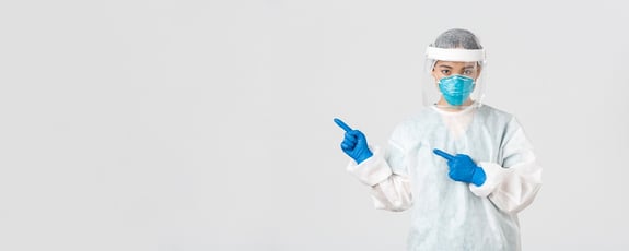 A group of operator wearing full suit cleanroom apparels