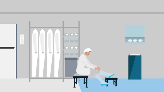 Illustration of a cleanroom gowning area with a person seated while donning protective boot covers.