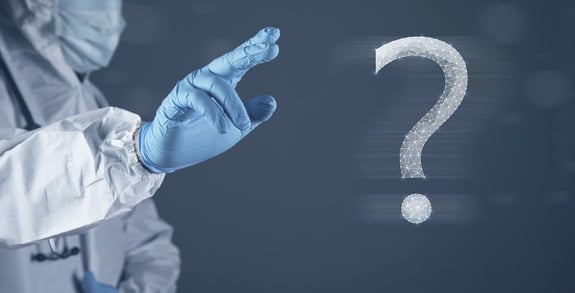 Photo question mark made from web and dots doctor clicks on the screen