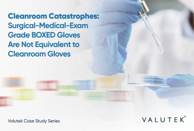 A Cleanroom Operator works in a cleanroom while wearing blue nitrile gloves. A Cleanroom Operator works in a cleanroom while wearing blue nitrile gloves.